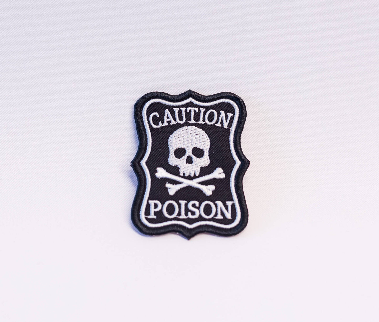 Caution, Poison